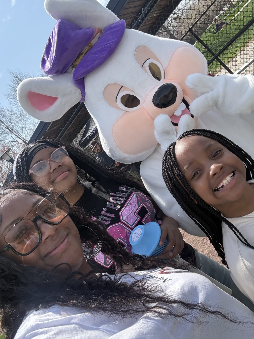 Volunteers spinning fresh cotton candy at the Easter event