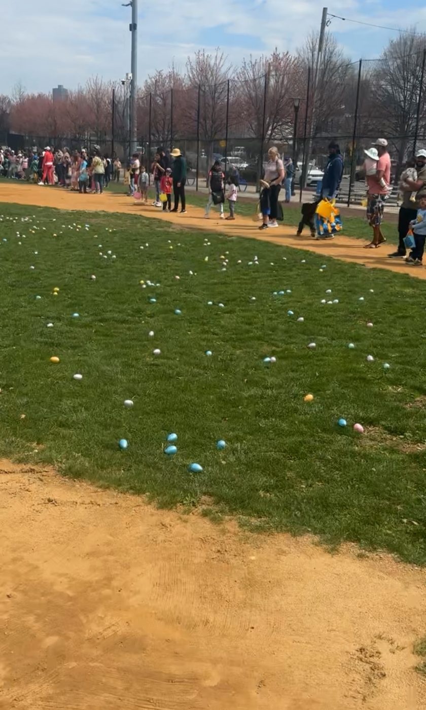 Thousands of Easter eggs spread across the field as families line up at Berry Lane Park