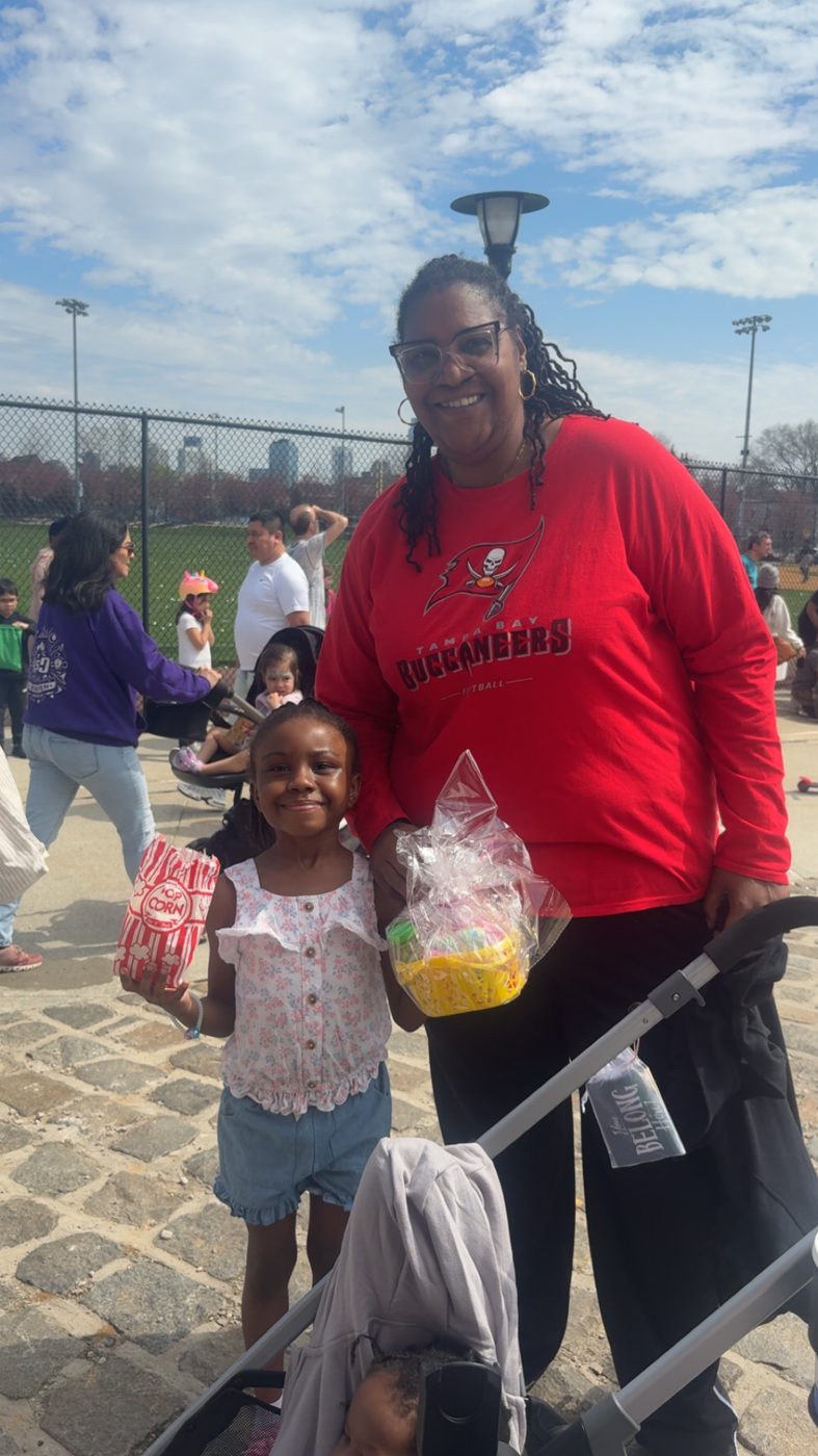 A young guest with popcorn and an Easter basket
