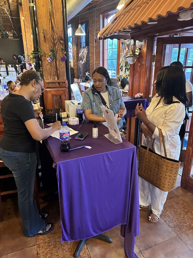 Guests checking in at the registration table for the Gift of Life Fundraiser