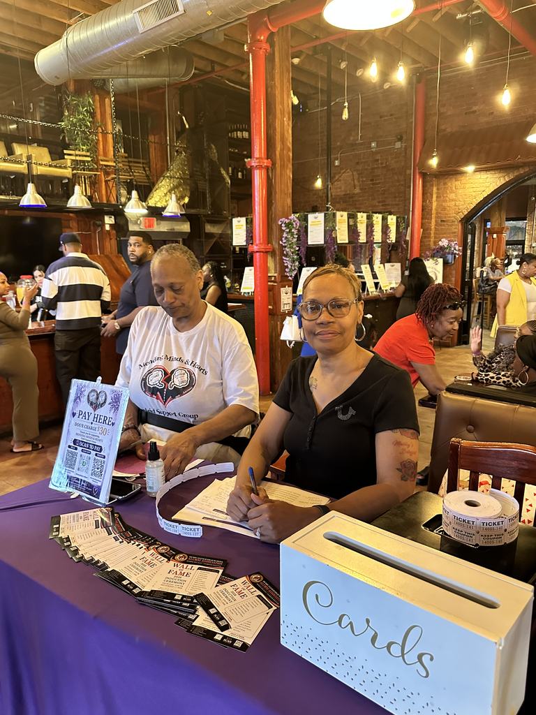 Volunteers staffing the check-in table at the Gift of Life Fundraiser