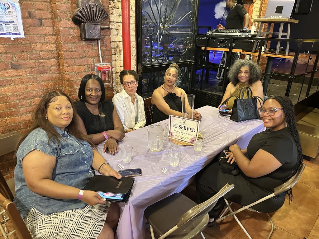 Guests seated together at a reserved table at the Gift of Life Fundraiser