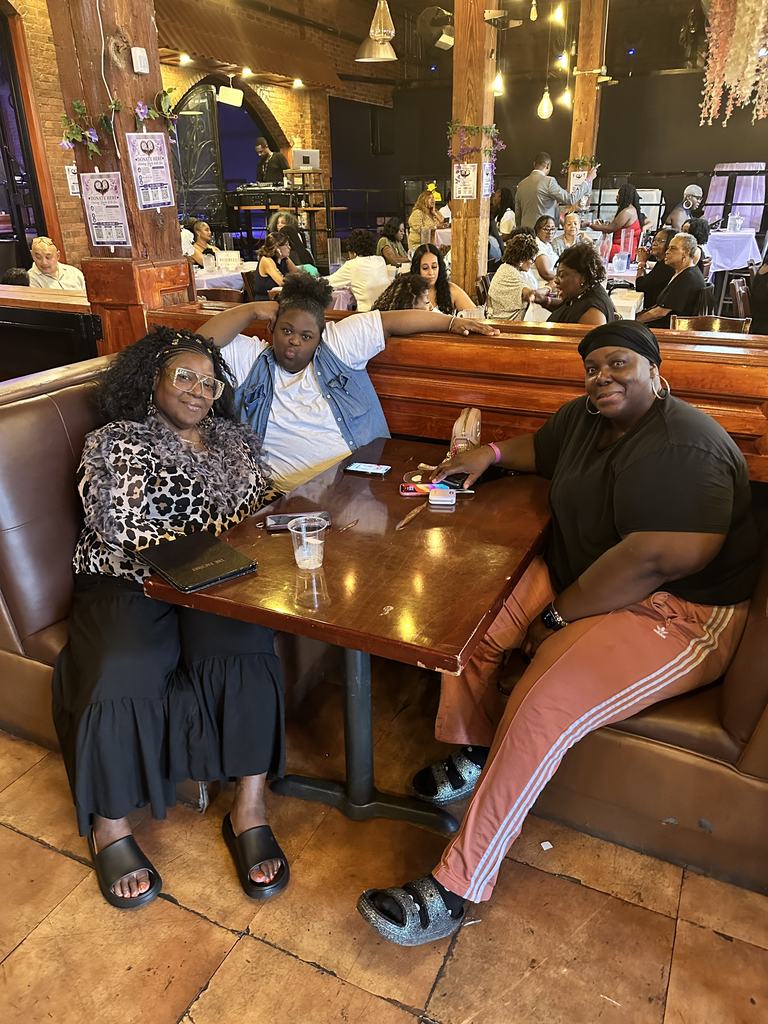 Guests gathered in a booth at the Gift of Life Fundraiser