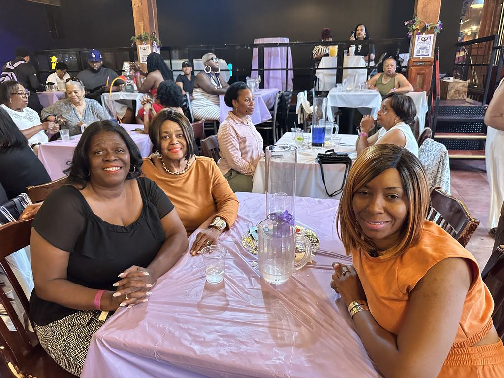 Three guests seated together at the Gift of Life Fundraiser