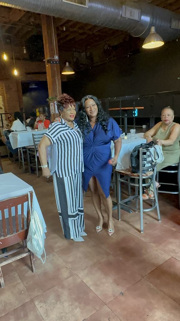 The founder greeting a guest at the Gift of Life Fundraiser