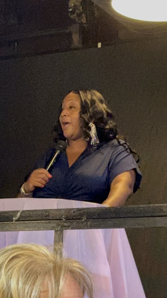 The founder speaking to the room at the Gift of Life Fundraiser