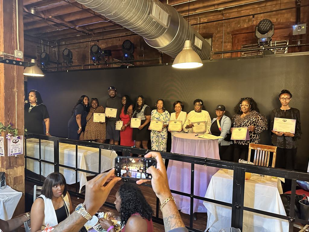 Honorees holding Certificates of Commitment to Healing at the fundraiser