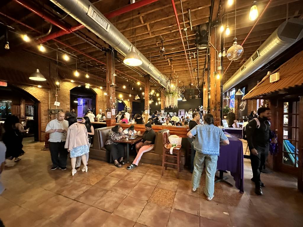 A wide view of guests gathered throughout the room at the Gift of Life Fundraiser