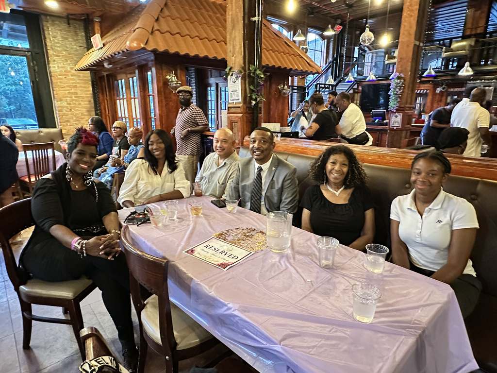 Guests seated together at a reserved table at the Gift of Life Fundraiser